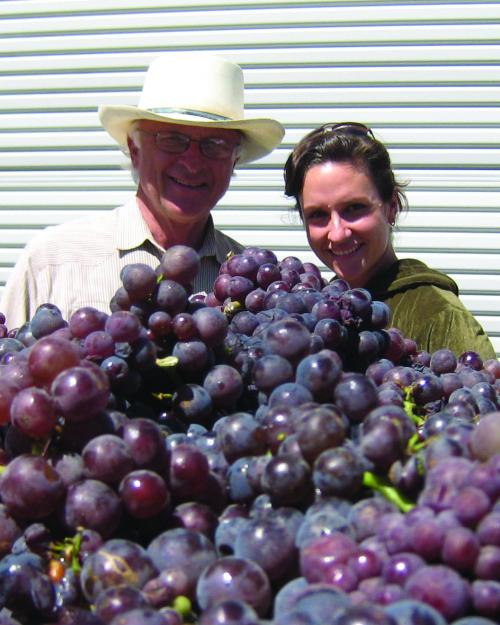 Louis Lucas and winemaker Megan McGrath Gates at a harvest years ago when they did not have to wear masks!