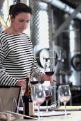 Megan McGrath Gates hard at work in the winery Megan McGrath Gates hard at work in the winery