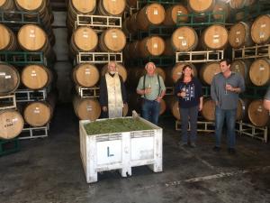 First Crush at Lucas & Lewellen Vineyards - image of winemaker, owners, and Father John Finley blessing the grapes