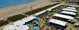 Photo of wine tasting tents on the beach in Santa Barbara, CA https://www.californiawinefestival.com/