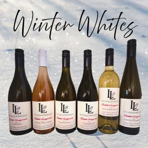 Winter Whites - six bottles of Lucas & Lewellen white wine against a snowy background